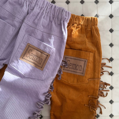 CORDUROY FRINGE FLARE PANTS