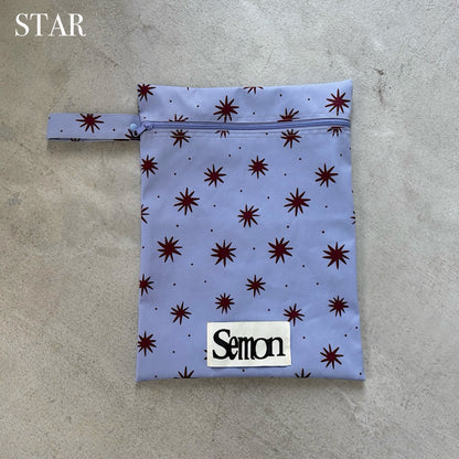 PATTERNED WATERPROOF POUCH